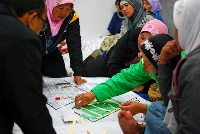 Women at a community meeting